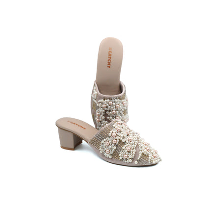 Embroidered mules Heels